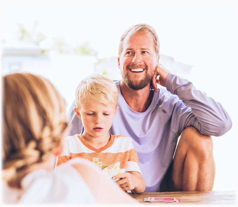 Man smiling with his family
